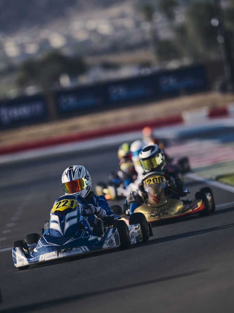 Reid Eck #221 three-wide with two other Mini karts at Champions of the Future Round 8, Winchester